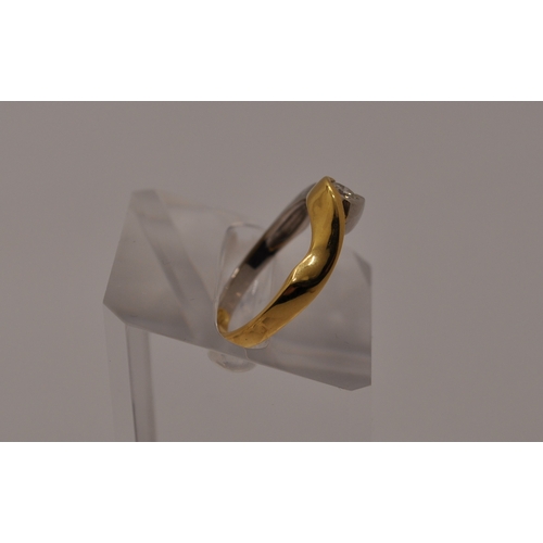 219 - 18ct yellow/white gold single stone diamond ring of approx  .20ct, stamped 750, approx size O