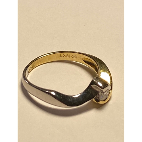 219 - 18ct yellow/white gold single stone diamond ring of approx  .20ct, stamped 750, approx size O