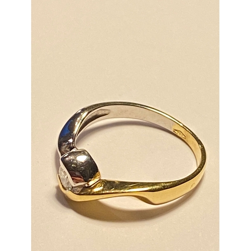 219 - 18ct yellow/white gold single stone diamond ring of approx  .20ct, stamped 750, approx size O