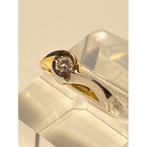 219 - 18ct yellow/white gold single stone diamond ring of approx  .20ct, stamped 750, approx size O