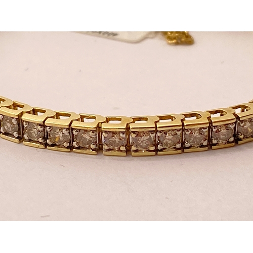 35 - 14ct yellow gold diamond tennis bracelet with approx 4cts, approx gross weight 16g