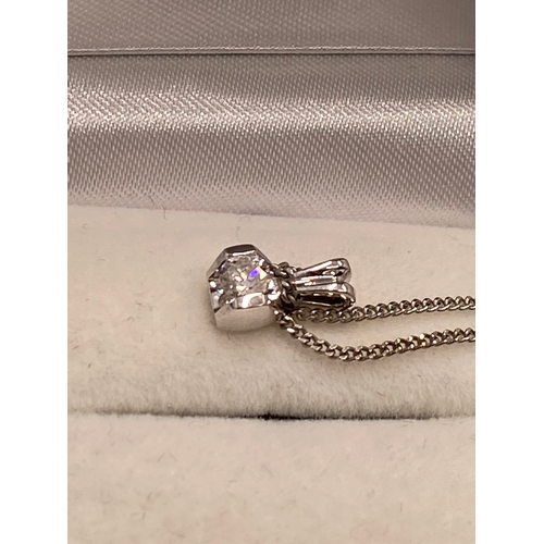 52 - 18ct white gold necklace with pendant approx 0.20cts, with hallmarks (box excluded)