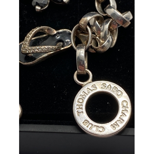 108 - Thomas Sabo Silver charm link bracelet stamped 925 with three silver charms, together with a Pandora... 