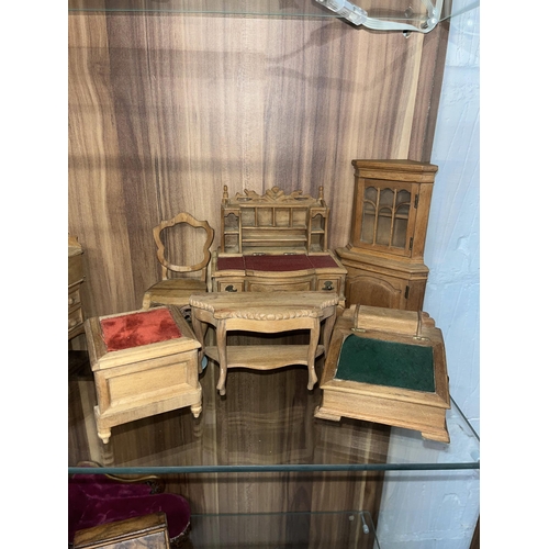 138 - Group of vintage handcrafted miniature furniture items constructed in various designs and woods, cre... 