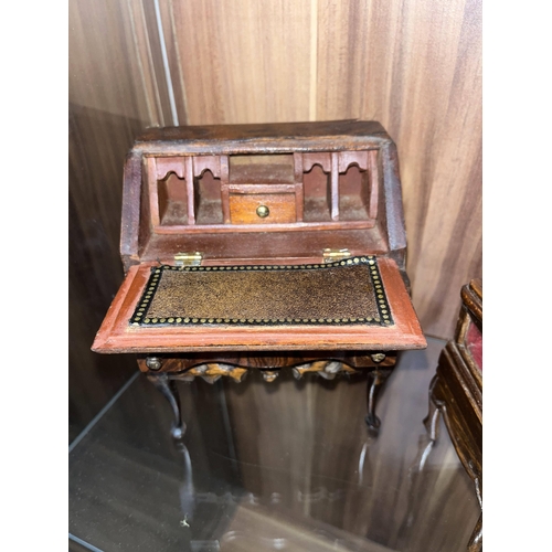 140 - Group of vintage handcrafted miniature furniture items constructed in walnut of assorted designs, cr... 