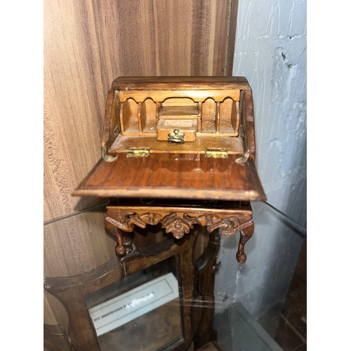 140 - Group of vintage handcrafted miniature furniture items constructed in walnut of assorted designs, cr... 