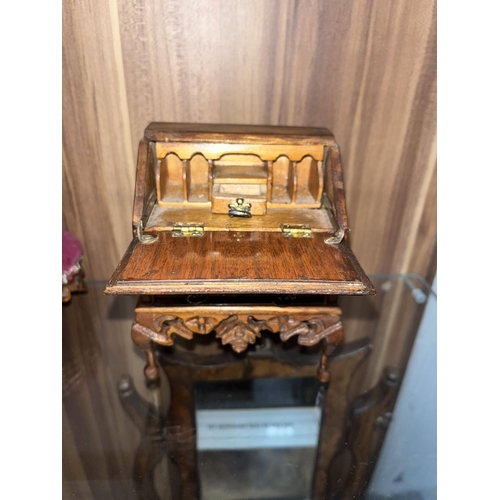 140 - Group of vintage handcrafted miniature furniture items constructed in walnut of assorted designs, cr... 