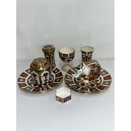 149 - A quantity of Crown Derby items with Imari pattern to include a pair of hexagon vases, 12 in total a... 