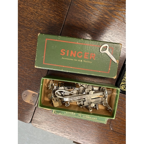 15 - Singer sewing machine serial no Y9496305, model no.66 with BRK electric motor on Singer table (model... 