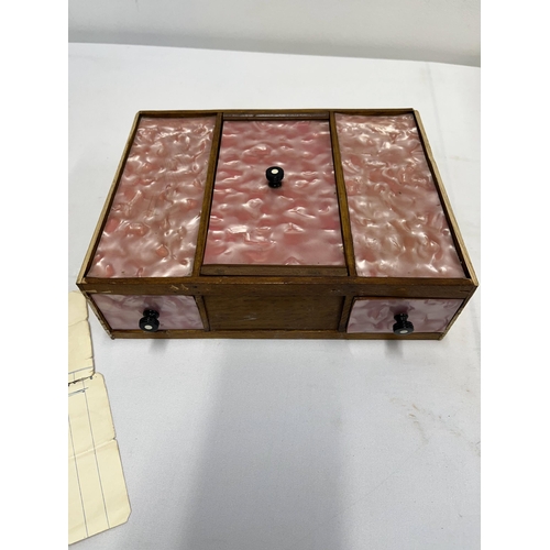 18 - A 1930 oak box with inlaid marquetry to top with pink mother of pearl style insert lids marked 'made... 