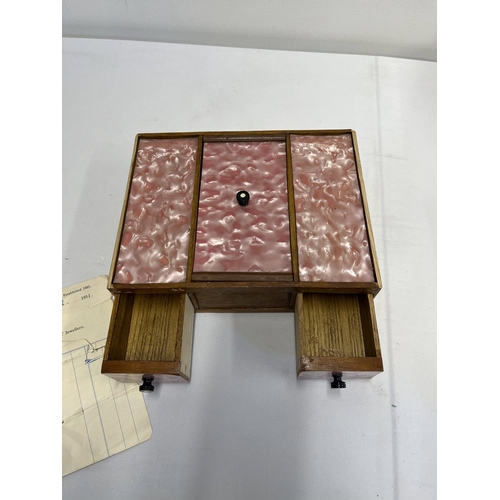 18 - A 1930 oak box with inlaid marquetry to top with pink mother of pearl style insert lids marked 'made... 