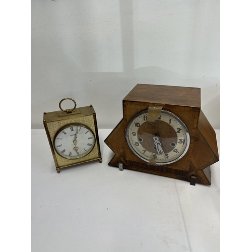 251 - Art deco inspired mantle clock marked foreign to front with one other clock together with a vintage ... 