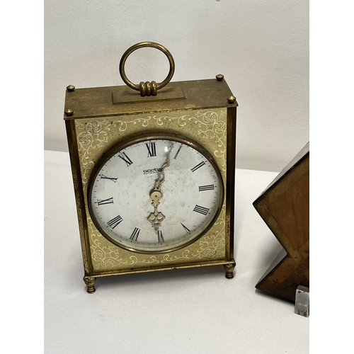 251 - Art deco inspired mantle clock marked foreign to front with one other clock together with a vintage ... 