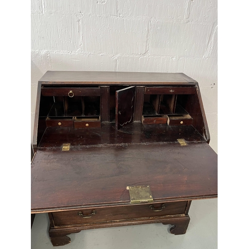 43 - Antique oak bureau, the fall front opening to reveal an interior arrangement of drawers and pull-dow... 