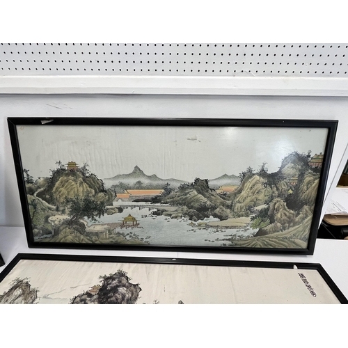 69 - A pair of oriental framed silks depicting landscape scenes alongside a framed 3D silk of a lady