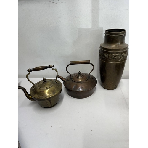 71 - An assortment of brass and copperware items to include chargers, kettles, buckets, jam pan etc.