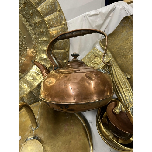 89 - A selection of brass and copperware to include a coal scuttle, charger, kettles, inkwell etc. A/F