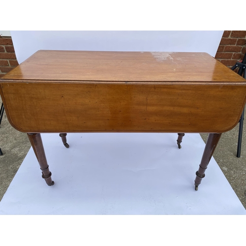 11 - Antique mahogany dropleaf table  with drawer, on castors A/F