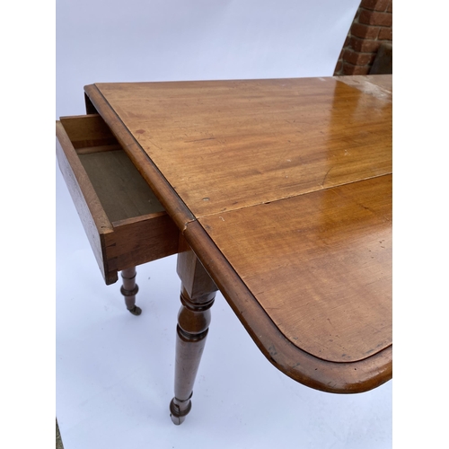 11 - Antique mahogany dropleaf table  with drawer, on castors A/F