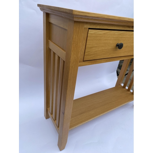 112 - Modern two drawer console table composed of solid wood (poss.John Lewis)