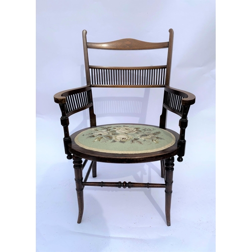 13 - Edwardian mahogany salon chair with serpentine/galleried design, inlaid detailing, and tapestry desi... 