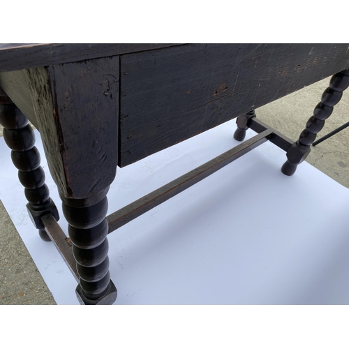 21 - Jacobean style two drawer side table with a bobbin turned leg design