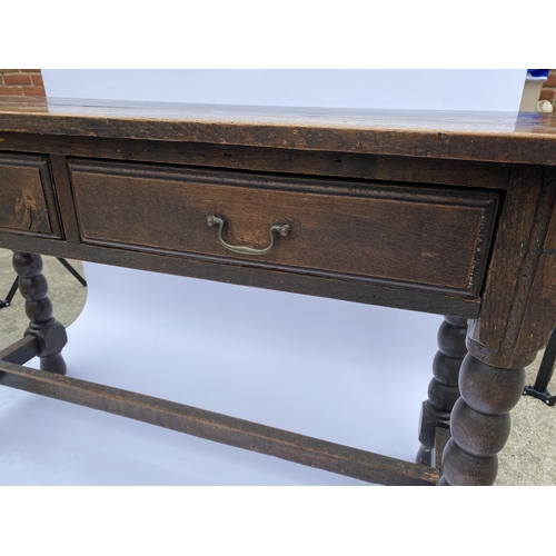 21 - Jacobean style two drawer side table with a bobbin turned leg design