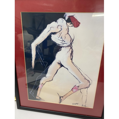 273 - Two framed prints of male form, one featuring speed skater by Andy Warhol