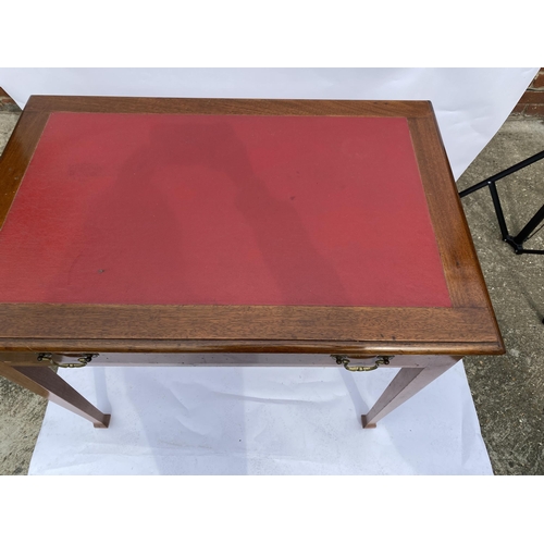 29 - Mahogany writing desk with single draw to front and with red leather style panel to top, approx. L91... 