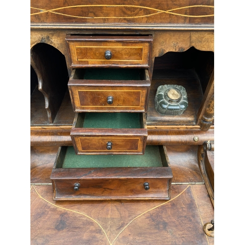 33 - Davenport style desk with drawers with inlaid trim, carved panel detailing, glass inkwell and key, a... 