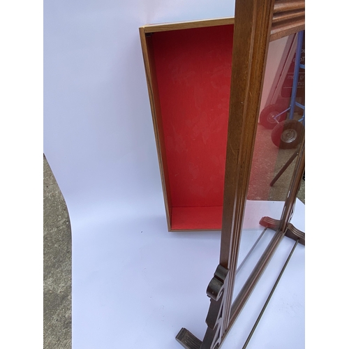 35 - Bespoke freestanding display cabinet with scroll detailing to top and upholstered with red interior,... 