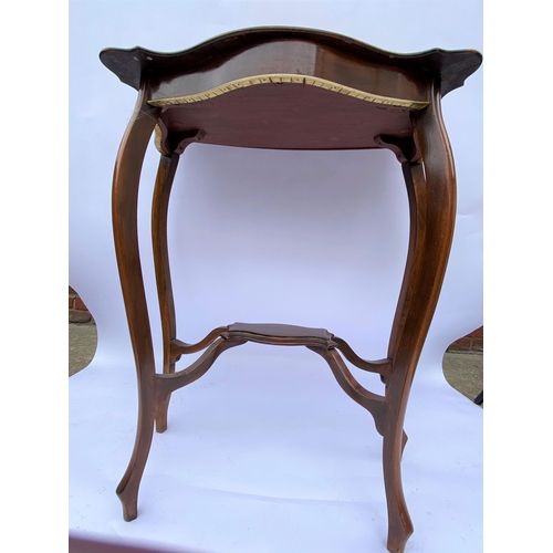 46 - Two tier mahogany table  with galleried design to top