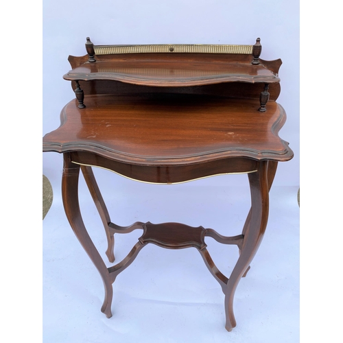 46 - Two tier mahogany table  with galleried design to top