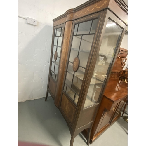 5 - Edwardian display cabinet with inlaid detailing, three shelves above storage compartment on tapered ... 