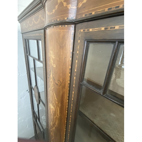 5 - Edwardian display cabinet with inlaid detailing, three shelves above storage compartment on tapered ... 