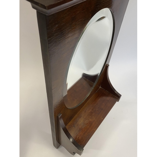 53 - A vintage mahogany cloakroom mirror with shelf and rail beneath, approx. overall H 57cm X W 33cm, D1... 