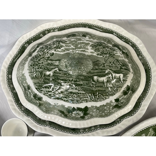 81 - A large quantity of Adams real English ironstone china depicting English countryside scene, terrines... 