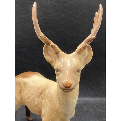 269 - Group of three Beswick deer family