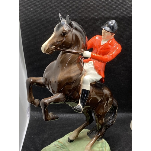 270 - Beswick huntsman on horse in rearing stance with hounds and one other horse and foal ceramic figure ... 