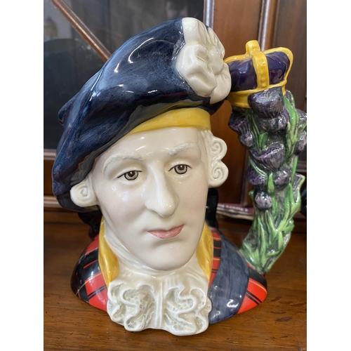 268 - A quantity of collectible Toby jugs of distinct designs including Bonnie Prince Charles, Chelsey Pen... 