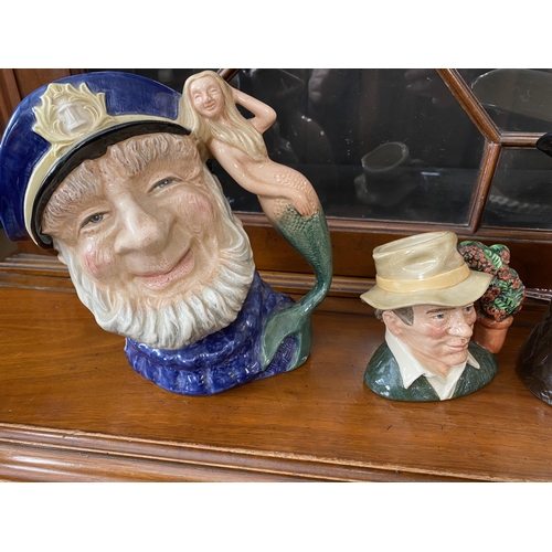 267 - A quantity of collectible Royal Doulton Toby jugs of distinct designs to include The Busker, Old Sal... 