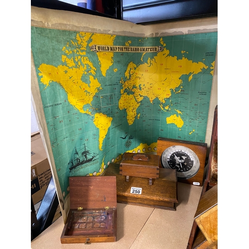 250 - A wood mounted world clock (purchased from Harrods), with a vintage world map for the radio amateur ... 