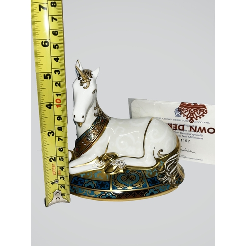 177 - Royal Crown Derby millennium unicorn paperweight, no. 1197 / 2000, with gold stopper in box.