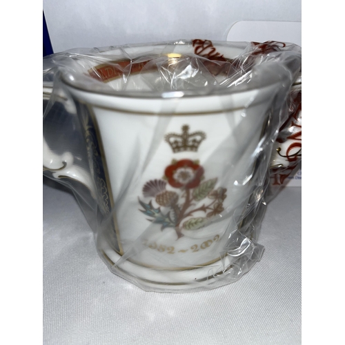 191 - Royal Crown Derby Golden Jubilee loving cup, no.130/1000 in plastic and box together with Royal Crow... 