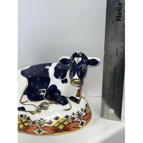 228 - Royal Crown Derby Friesian cow paperweight with gold stopper in box