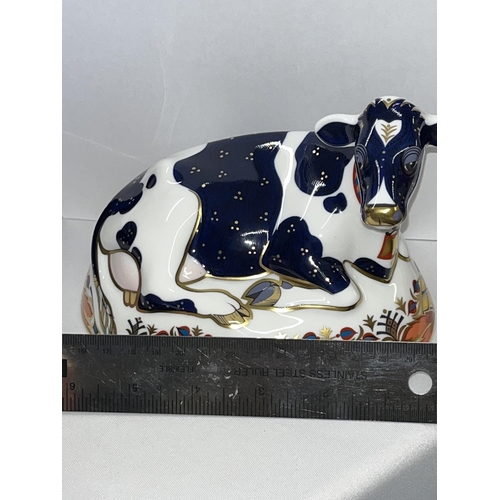 228 - Royal Crown Derby Friesian cow paperweight with gold stopper in box