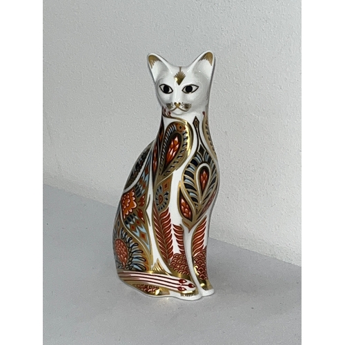 204 - Royal Crown Derby paperweights in the form of a Siamese cat together with a Siamese kitten both with... 