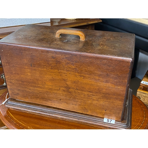 57 - A PFAFF antique sewing machine in black with gold trim serial number 164134 complete with wooden box... 