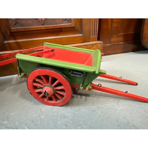 72 - Two bespoke made wooden model carts painted in red and green