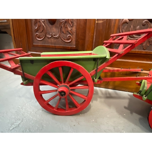 72 - Two bespoke made wooden model carts painted in red and green